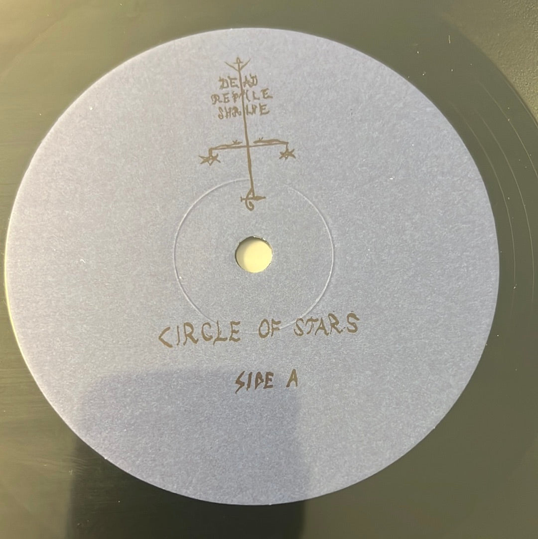 DEAD REPTILE SHRINE - the sun of circles and wood