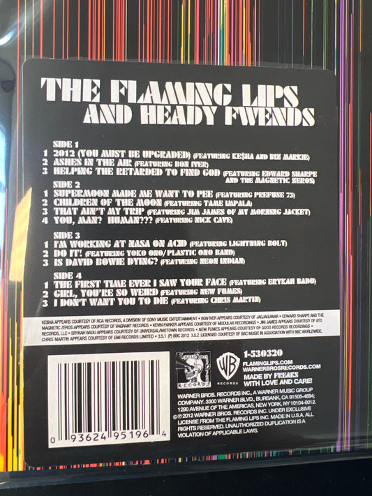 THE FLAMING LIPS “AND HEADY FWENDS”