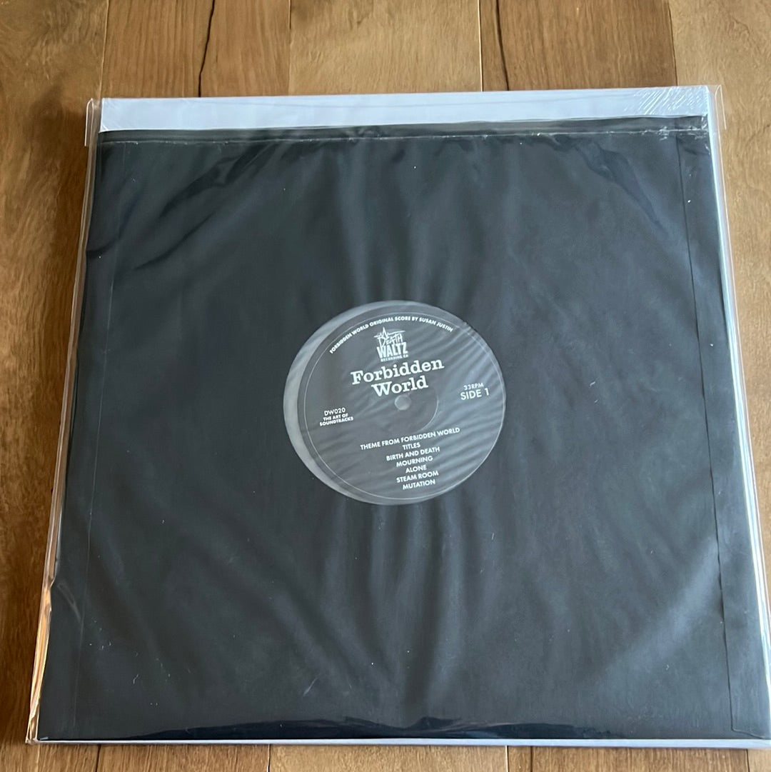 FORBIDDEN WORLD - Susan Justin