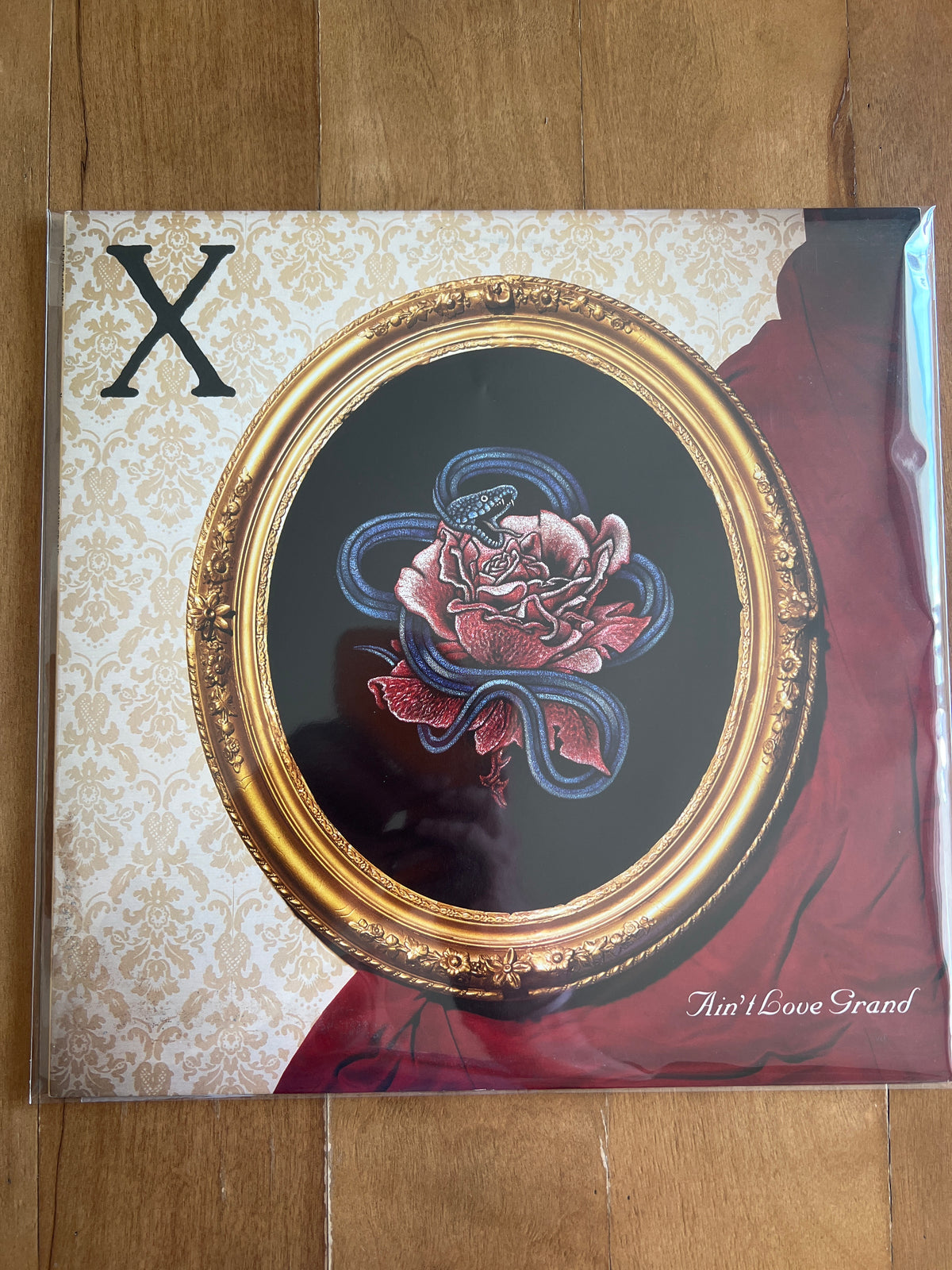 X - ain’t love grand
