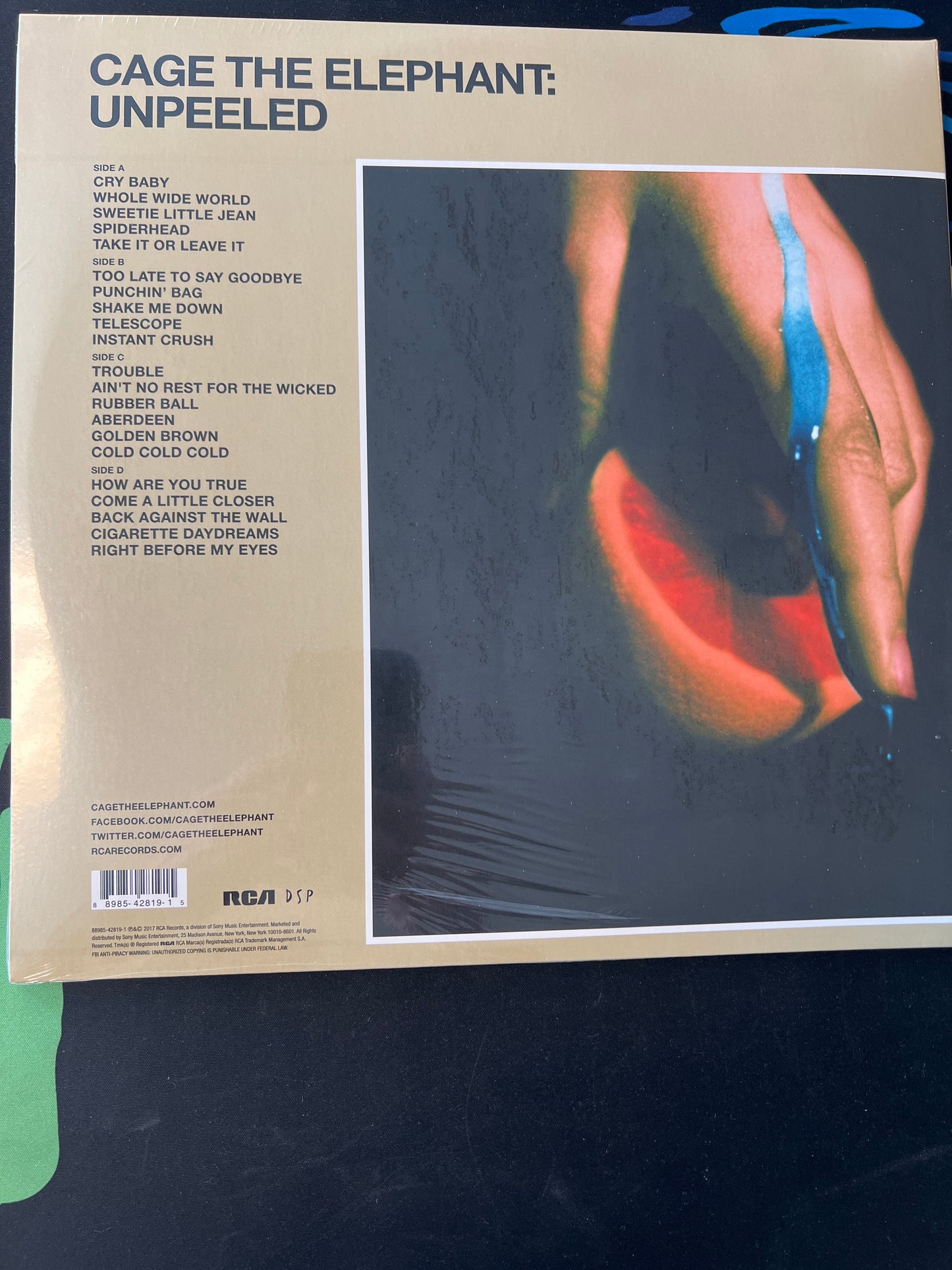 CAGE THE ELEPHANT- unpeeled