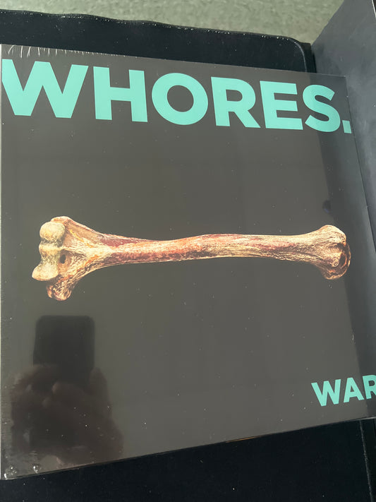 WHORES. - War.