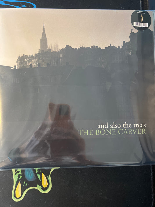 AND ALSO THE TREES - the bone carver