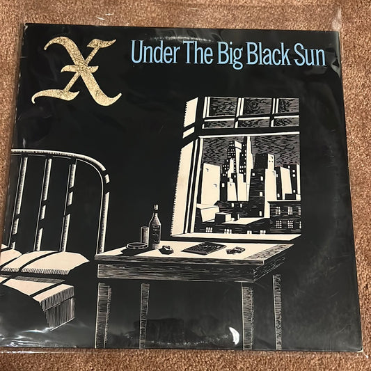 X - under the big black sun