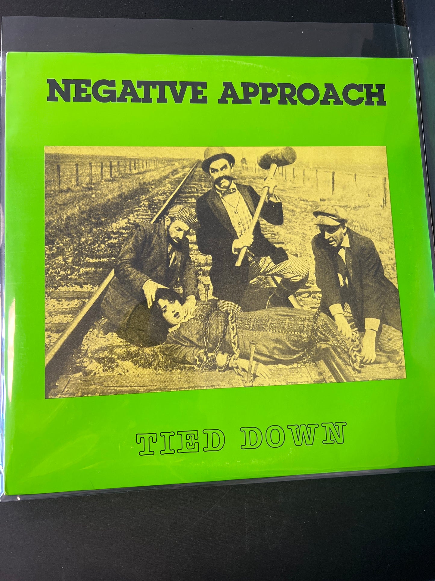 NEGATIVE APPROACH - tied down