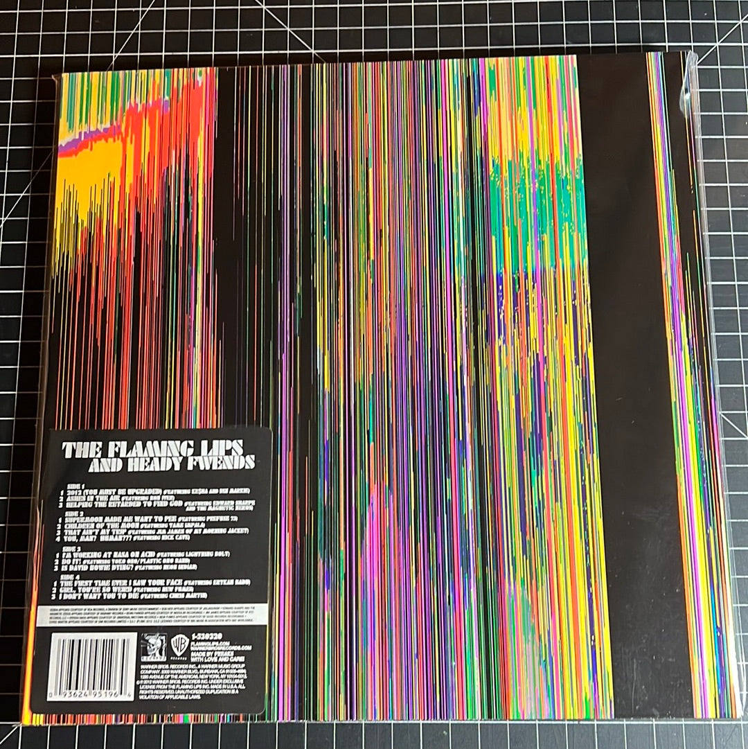 THE FLAMING LIPS “AND HEADY FWENDS”