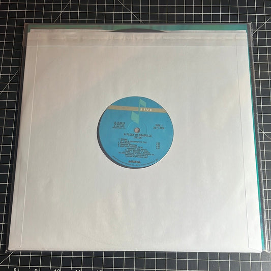A FLOCK OF SEAGULLS “listen”