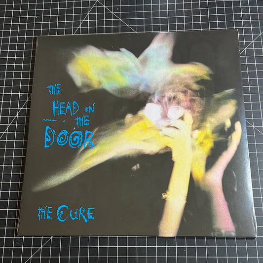 THE CURE “the head on the door”