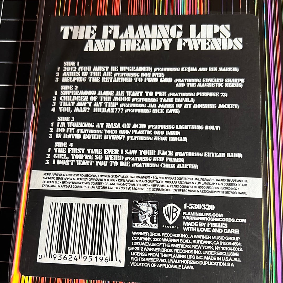 THE FLAMING LIPS “AND HEADY FWENDS”